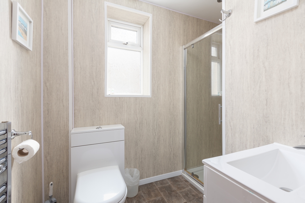 Self catering holiday apartments Blackpool. Beachcliffe apartments  7 shower.  Shower, toilet, hand basin and heated towel rail.